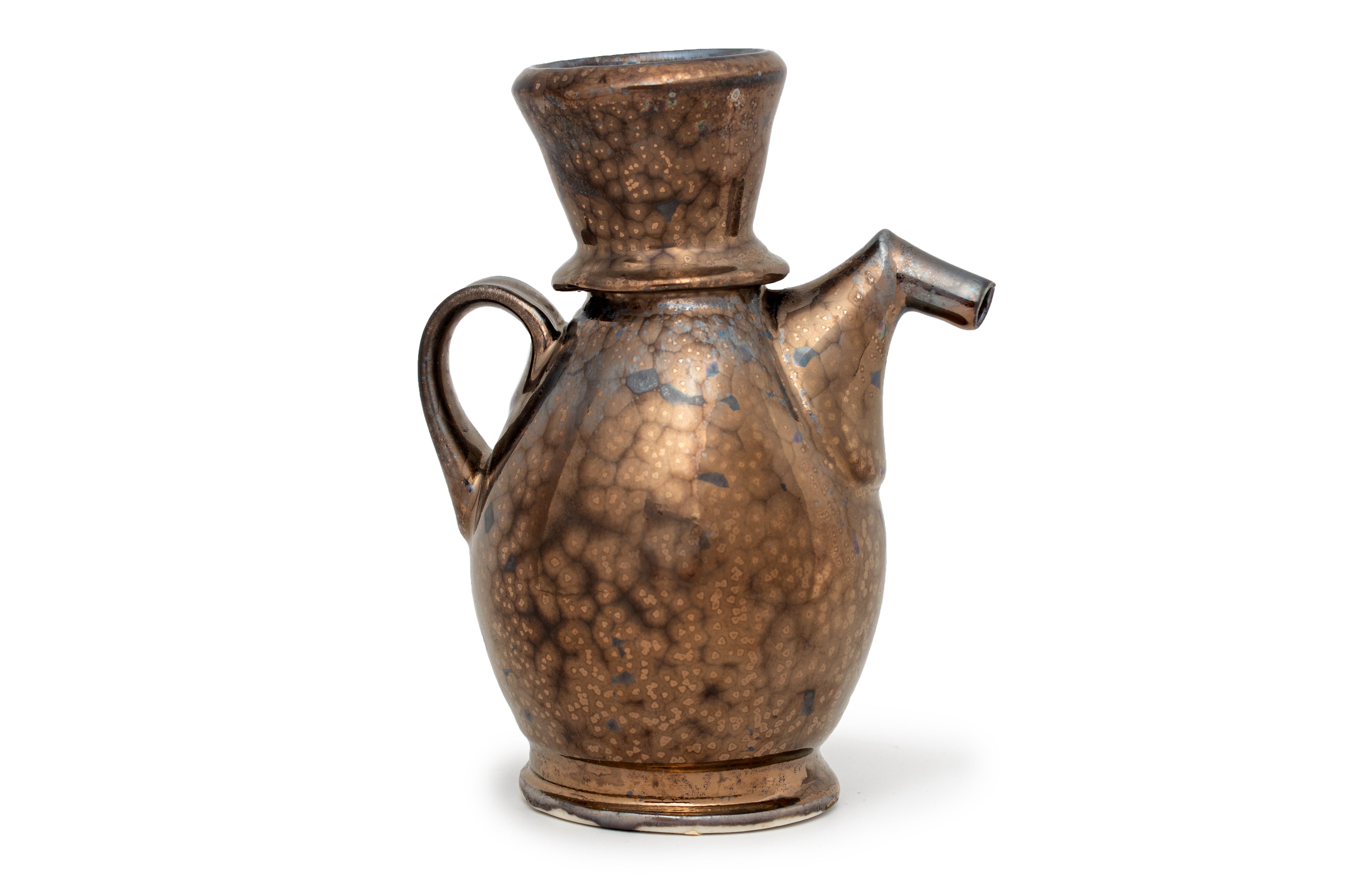 A John Britt Ewer glazed with crystalline bronze colored glaze against a white background. 